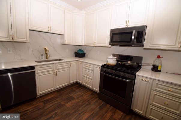 Interior, Kitchen, Marble Walls, Recessed Lighting, Wood Texture Flooring