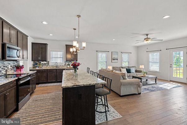 Chandelier, Dining room, Interior, Kitchen, Living room, Pendant Lights, Recessed Lighting, Wood Texture Flooring