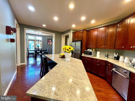 Dining room, Interior, Kitchen, Pendant Lights, Recessed Lighting, Stainless Steel Appliances, Wood Texture Flooring