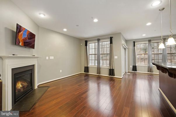 Empty room, Fireplace, Interior, Pendant Lights, Recessed Lighting, Wood Texture Flooring