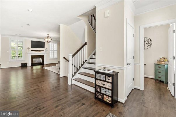 Chandelier, Fireplace, Interior, Recessed Lighting, Wood Texture Flooring