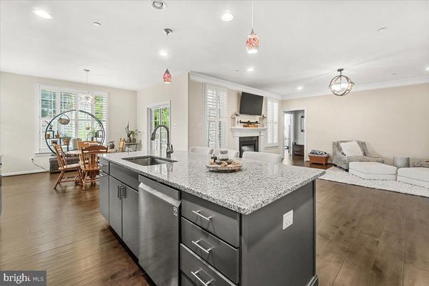 Dining room, Fireplace, Interior, Kitchen, Living room, Pendant Lights, Recessed Lighting, Wood Texture Flooring