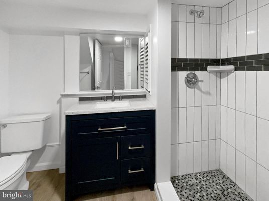 Bathroom, Glass Shower, Interior, Recessed Lighting, Wood Texture Flooring