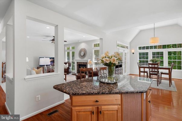 Dining room, Fireplace, Interior, Living room, Pendant Lights, Recessed Lighting, Wood Texture Flooring