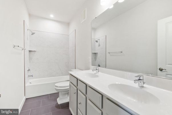 Bathroom, Dual Sink Vanities, Interior, Marble Walls, Recessed Lighting