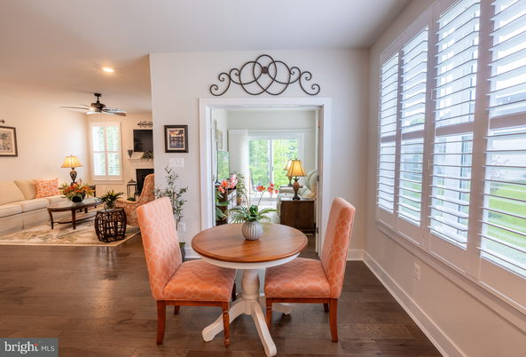 Dining room, Fireplace, Interior, Living room, Recessed Lighting, Wood Texture Flooring