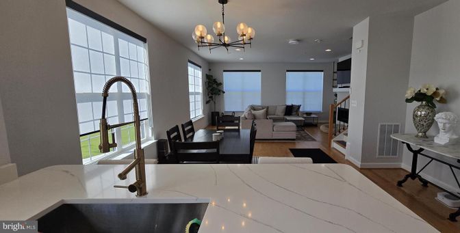 Chandelier, Dining room, Interior, Living room, Recessed Lighting, Wood Texture Flooring