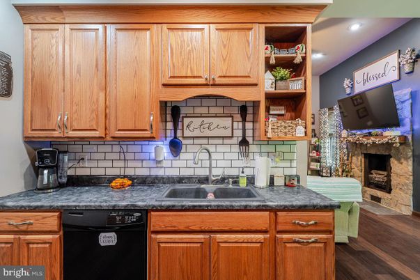 Fireplace, Interior, Kitchen, Recessed Lighting, Wood Texture Flooring