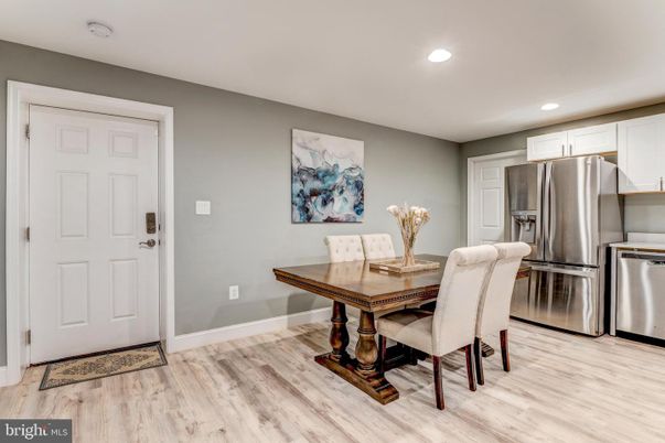 Dining room, Interior, Kitchen, Recessed Lighting, Stainless Steel Appliances, Wood Texture Flooring