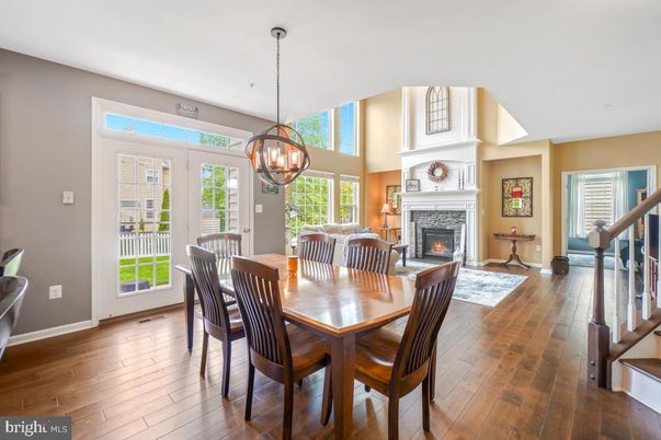 Chandelier, Dining room, Fireplace, Interior, Pendant Lights, Wood Texture Flooring