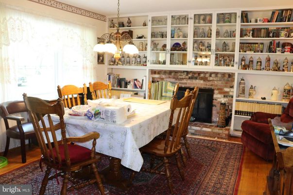 Dining room, Fireplace, Interior, Pendant Lights, Wood Texture Flooring