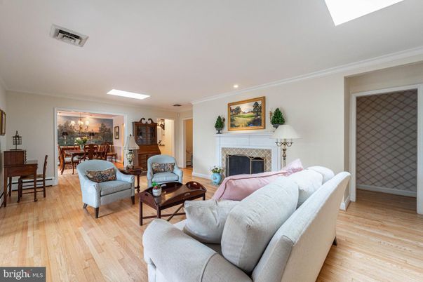 Dining room, Fireplace, Interior, Living room, Recessed Lighting, Wood Texture Flooring