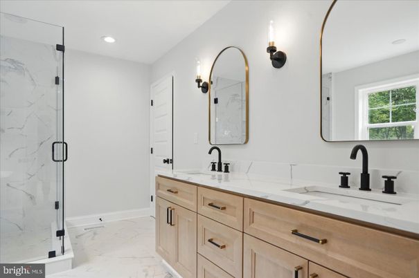 Bathroom, Dual Sink Vanities, Glass Shower, Interior, Marble, Marble Walls, Recessed Lighting