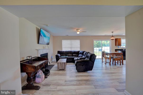 Dining room, Fireplace, Interior, Living room, Pendant Lights, Wood Texture Flooring