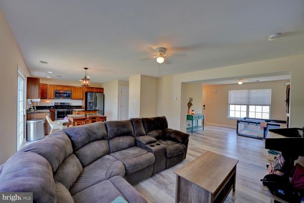 Dining room, Interior, Kitchen, Living room, Recessed Lighting, Stainless Steel Appliances, Wood Texture Flooring