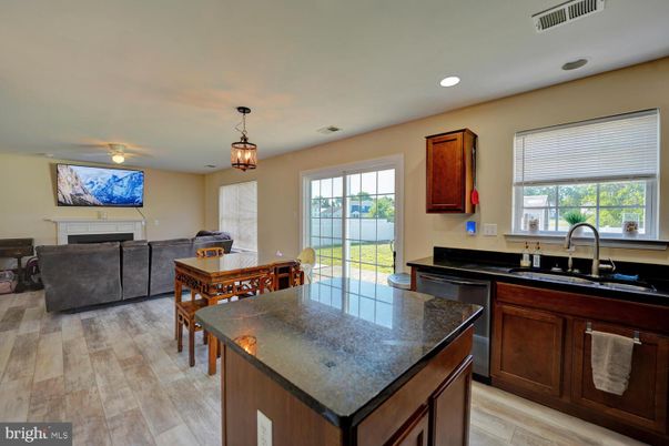 Dining room, Fireplace, Interior, Kitchen, Living room, Pendant Lights, Recessed Lighting, Wood Texture Flooring