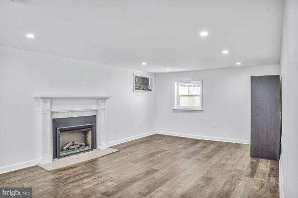 Empty room, Fireplace, Interior, Recessed Lighting, Wood Texture Flooring