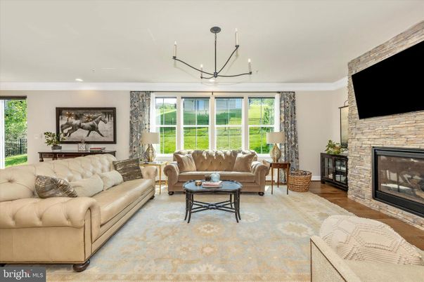 Fireplace, Interior, Living room, Pendant Lights, Recessed Lighting, Stone Walls, Wood Texture Flooring