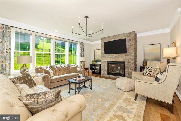 Fireplace, Interior, Living room, Recessed Lighting, Stone Walls, Wood Texture Flooring