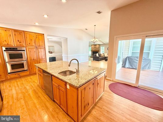 Fireplace, Interior, Kitchen, Pendant Lights, Recessed Lighting, Stainless Steel Appliances, Wood Texture Flooring