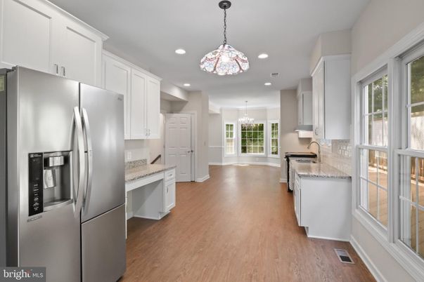 Chandelier, Interior, Kitchen, Pendant Lights, Recessed Lighting, Stainless Steel Appliances, Wood Texture Flooring