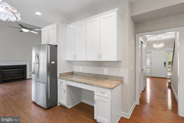 Chandelier, Fireplace, Interior, Kitchen, Recessed Lighting, Wood Texture Flooring