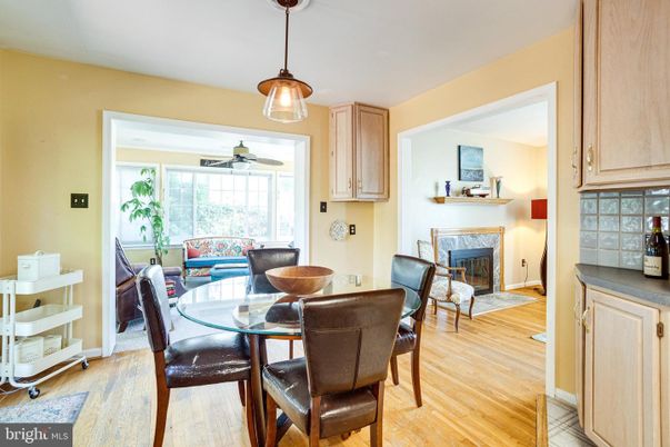 Dining room, Fireplace, Interior, Pendant Lights, Wood Texture Flooring