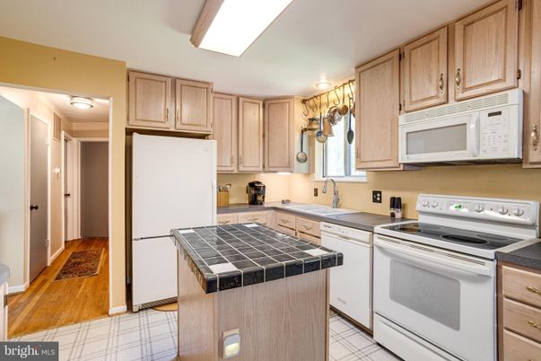 Interior, Kitchen, Tile Countertops, Wood Texture Flooring