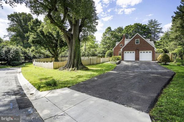 Attached, Backyard, Exterior, Facade, Brick Facade, Tudor Revival