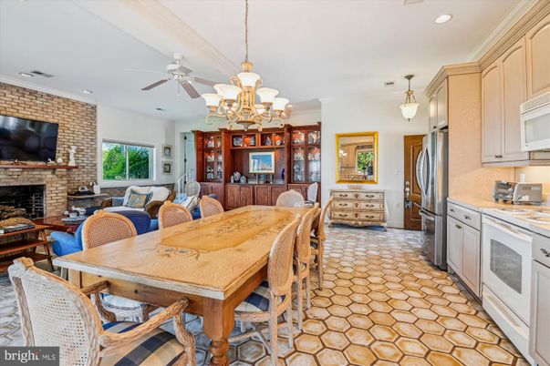 Chandelier, Dining room, Fireplace, Interior, Kitchen, Living room, Pendant Lights, Recessed Lighting, Stone Walls