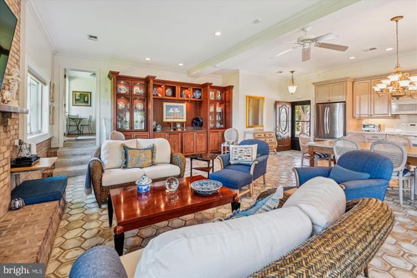 Chandelier, Dining room, Fireplace, Interior, Kitchen, Living room, Recessed Lighting, Stainless Steel Appliances