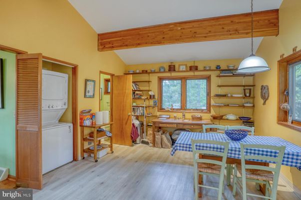 Dining room, Interior, Pendant Lights, Utility Closets, Washer, Wooden Beams, Wood Texture Flooring