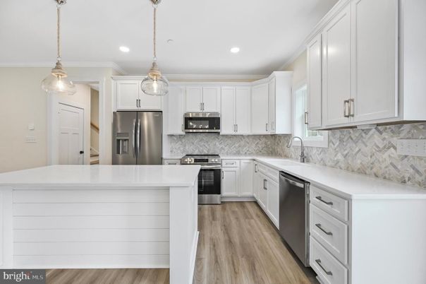 Interior, Kitchen, Pendant Lights, Recessed Lighting, Stainless Steel Appliances, Wood Texture Flooring