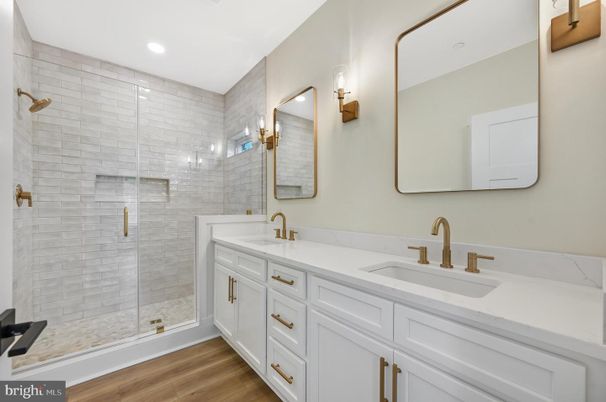 Bathroom, Dual Sink Vanities, Glass Shower, Interior, Recessed Lighting, Wood Texture Flooring