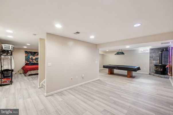 Billiard Table, Fireplace, Game Room, Interior, Recessed Lighting, Wood Texture Flooring