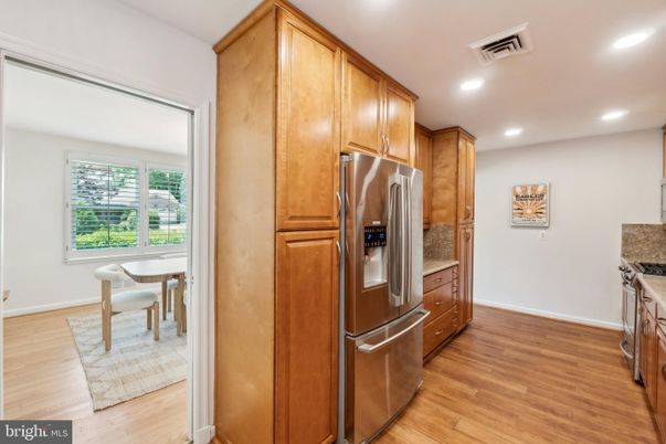 Dining room, Interior, Kitchen, Recessed Lighting, Stainless Steel Appliances, Wood Texture Flooring