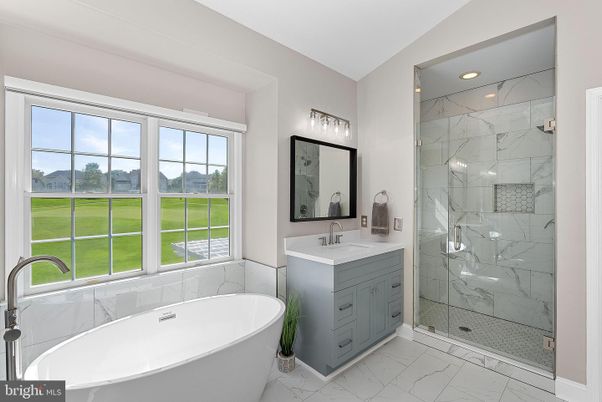 Bathroom, Dual Sink Vanities, Free Standing Baths, Glass Shower, Interior, Marble, Marble Walls, Recessed Lighting