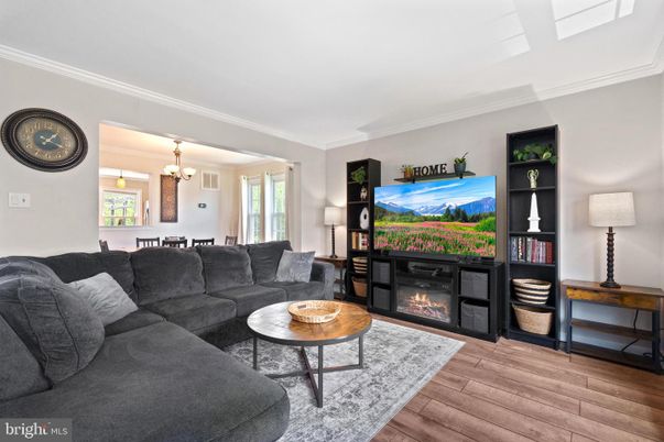 Chandelier, Dining room, Fireplace, Interior, Living room, Pendant Lights, Wood Texture Flooring
