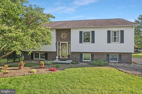 Exterior, Facade, Brick Facade, Raised Ranch