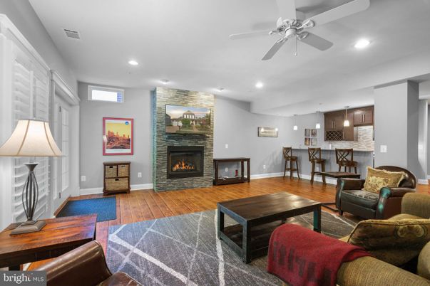 Fireplace, Interior, Kitchen, Living room, Pendant Lights, Recessed Lighting, Stone Walls, Wood Texture Flooring