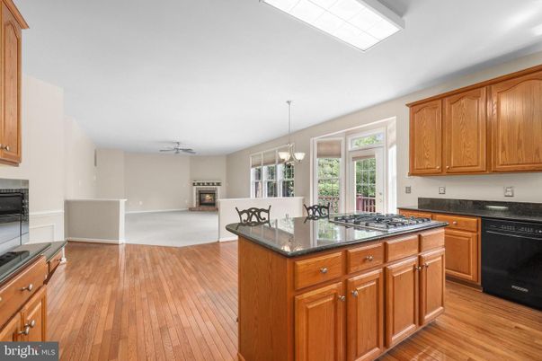 Chandelier, Dining room, Fireplace, Interior, Kitchen, Wood Texture Flooring