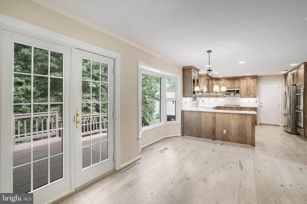 Chandelier, Interior, Kitchen, Recessed Lighting, Stainless Steel Appliances, Wood Texture Flooring