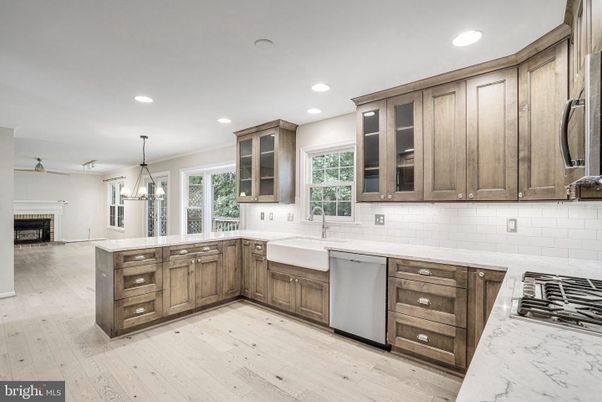 Chandelier, Fireplace, Interior, Kitchen, Recessed Lighting, Wood Texture Flooring