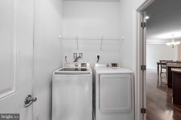 Chandelier, Interior, Recessed Lighting, Utility Closets, Washer, Wood Texture Flooring