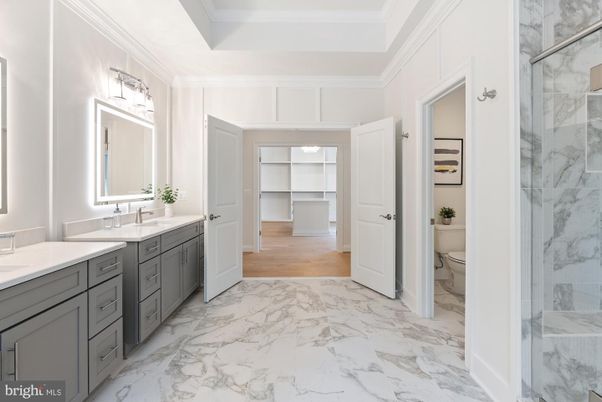 Bathroom, Dual Sink Vanities, Interior, Marble, Marble Walls, Wood Texture Flooring