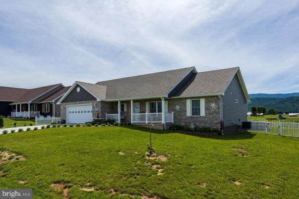 Attached, Backyard, Exterior, Facade, Brick Facade, Cape Cod