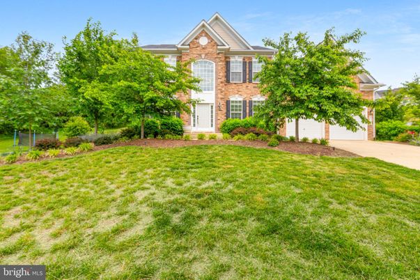 Attached, Backyard, Exterior, Facade, Brick Facade, Brick Traditional