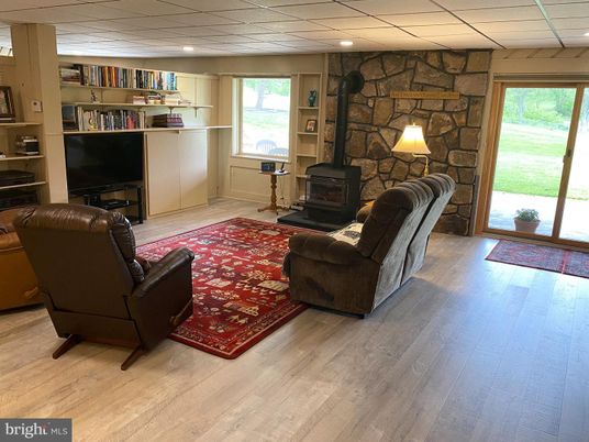 Fireplace, Interior, Recessed Lighting, Stone Walls, Wood Texture Flooring