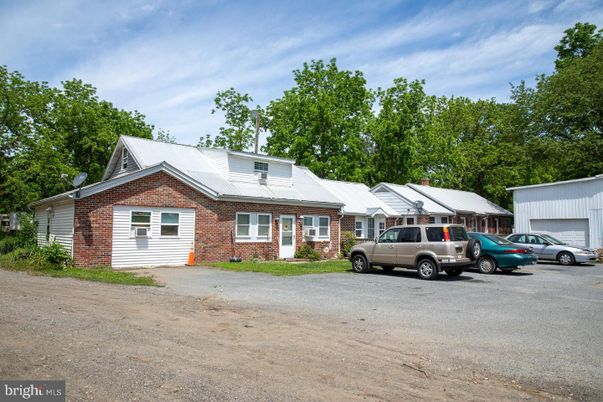 Exterior, Facade, Brick Facade, Cape Cod