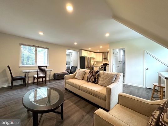 Dining room, Interior, Kitchen, Living room, Recessed Lighting, Stainless Steel Appliances, Wood Texture Flooring